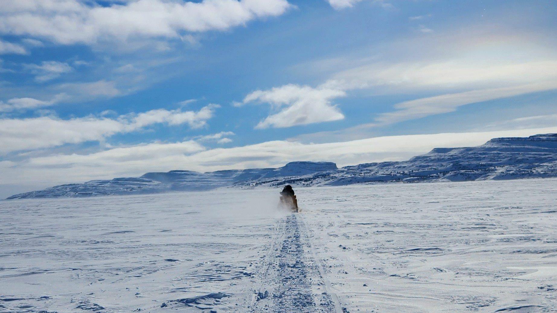 On Tasiujaq lake by snowmobile